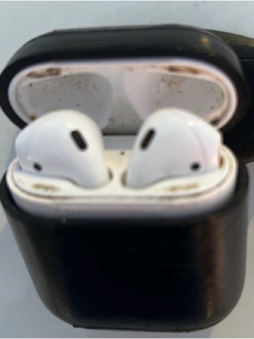 Apple White Earbuds with Black Charging Case
